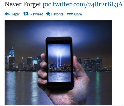 Image of phone taking picture of lights in place of twin towers