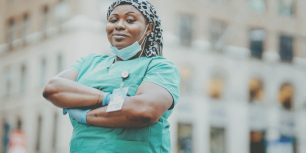 Healthcare employee in blue scrubs