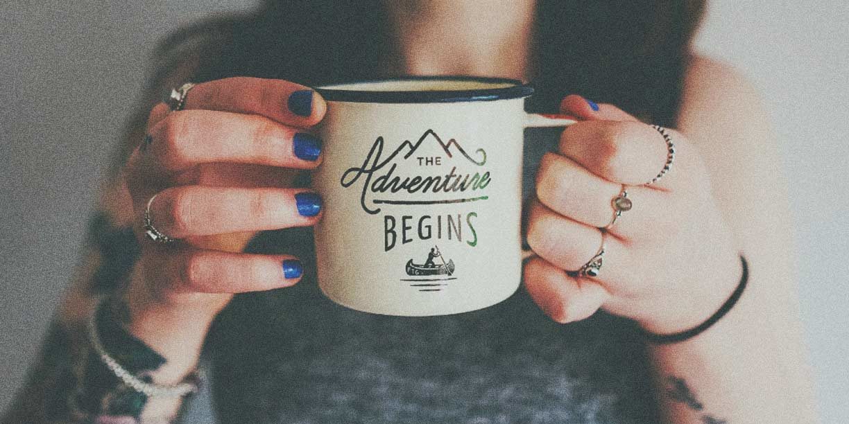 Woman holding coffee cup