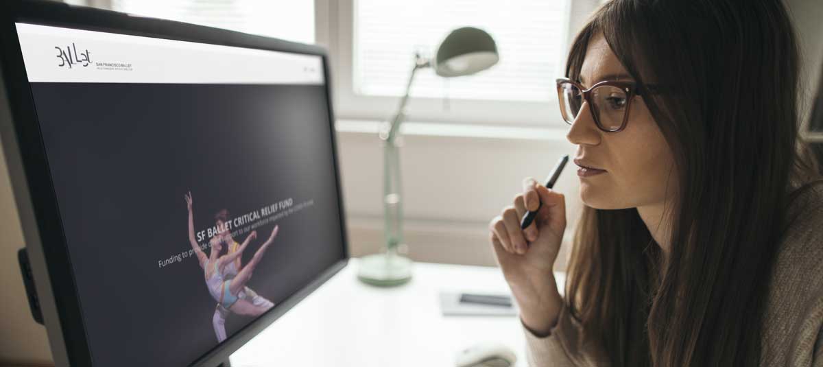 Girl working on ballet website