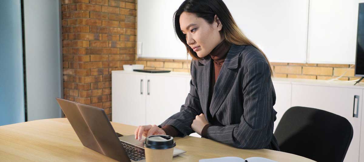 woman typing on computer