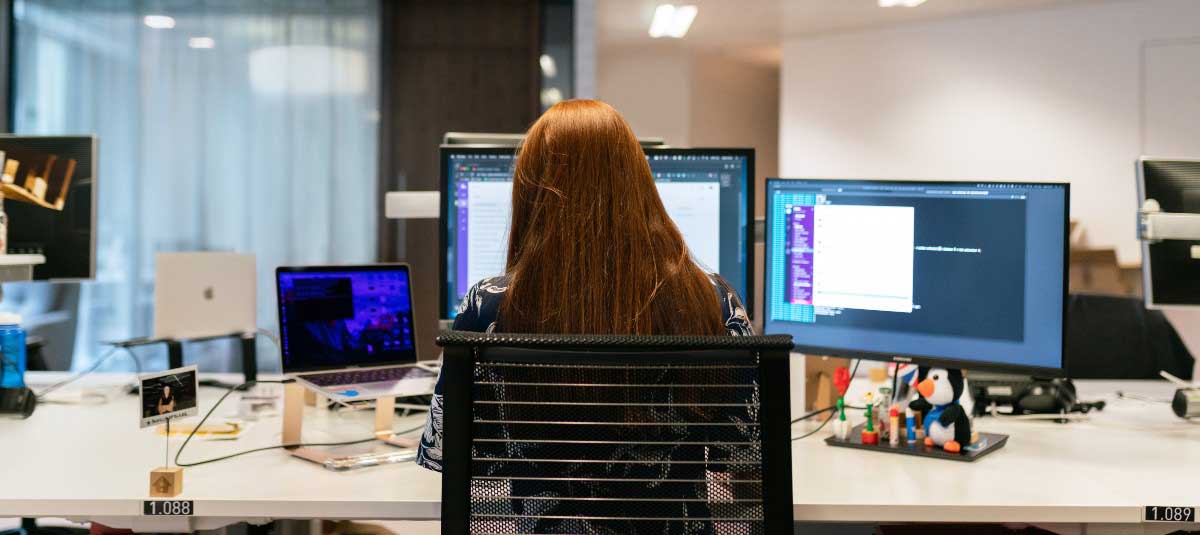 woman typing on computer