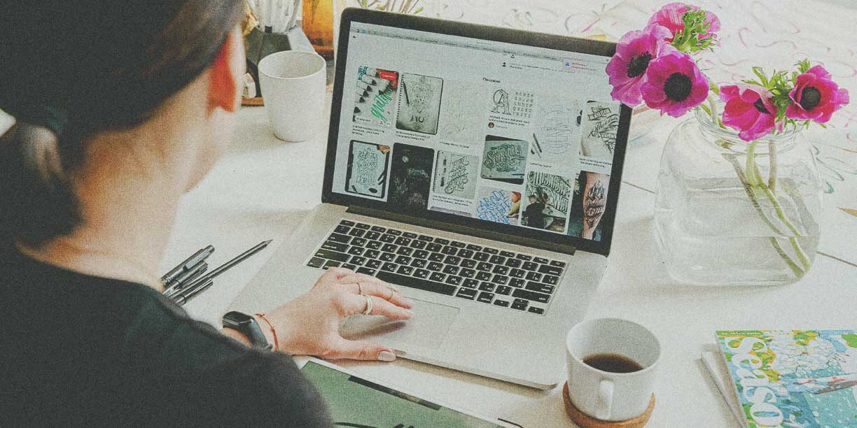 Woman working on a visual storytelling project on her laptop