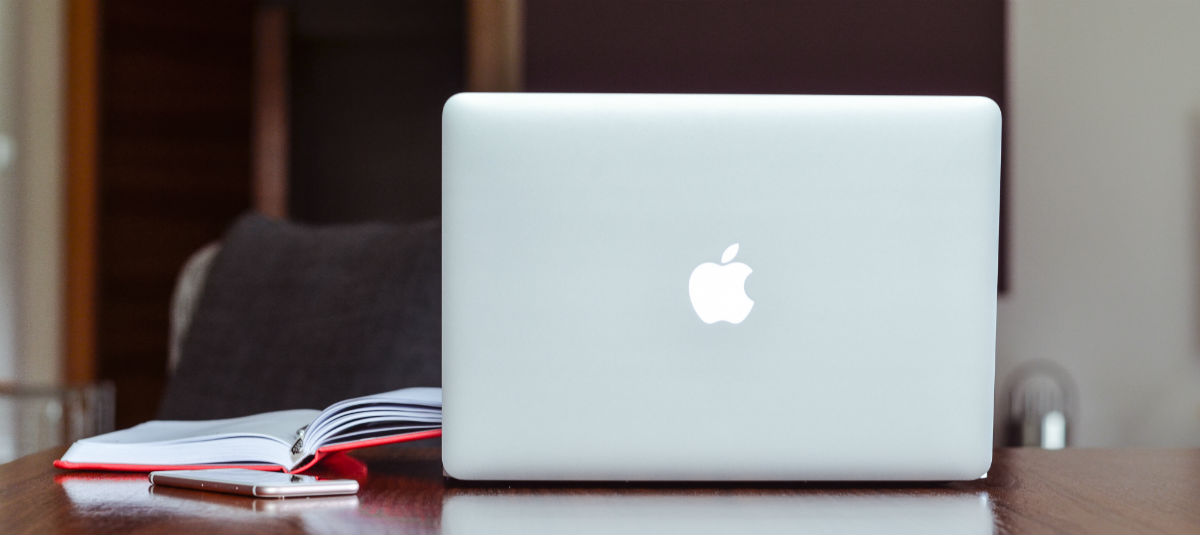 Macbook with Notepad