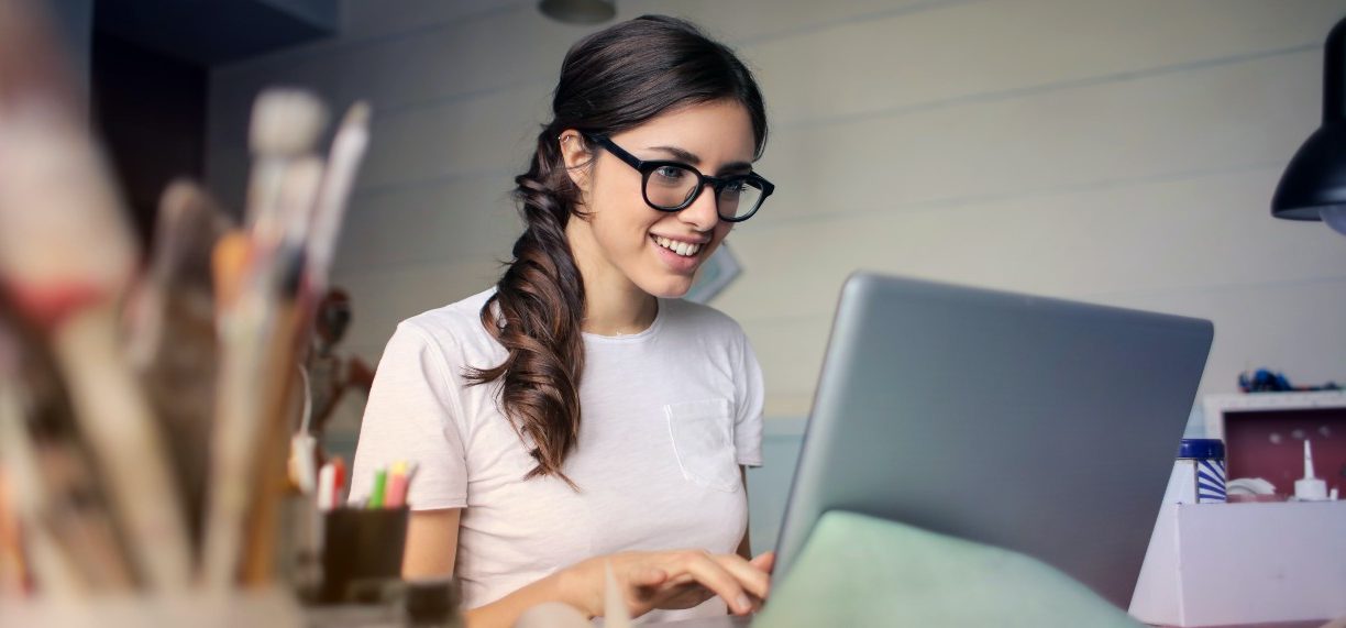 Girl typing on a computer