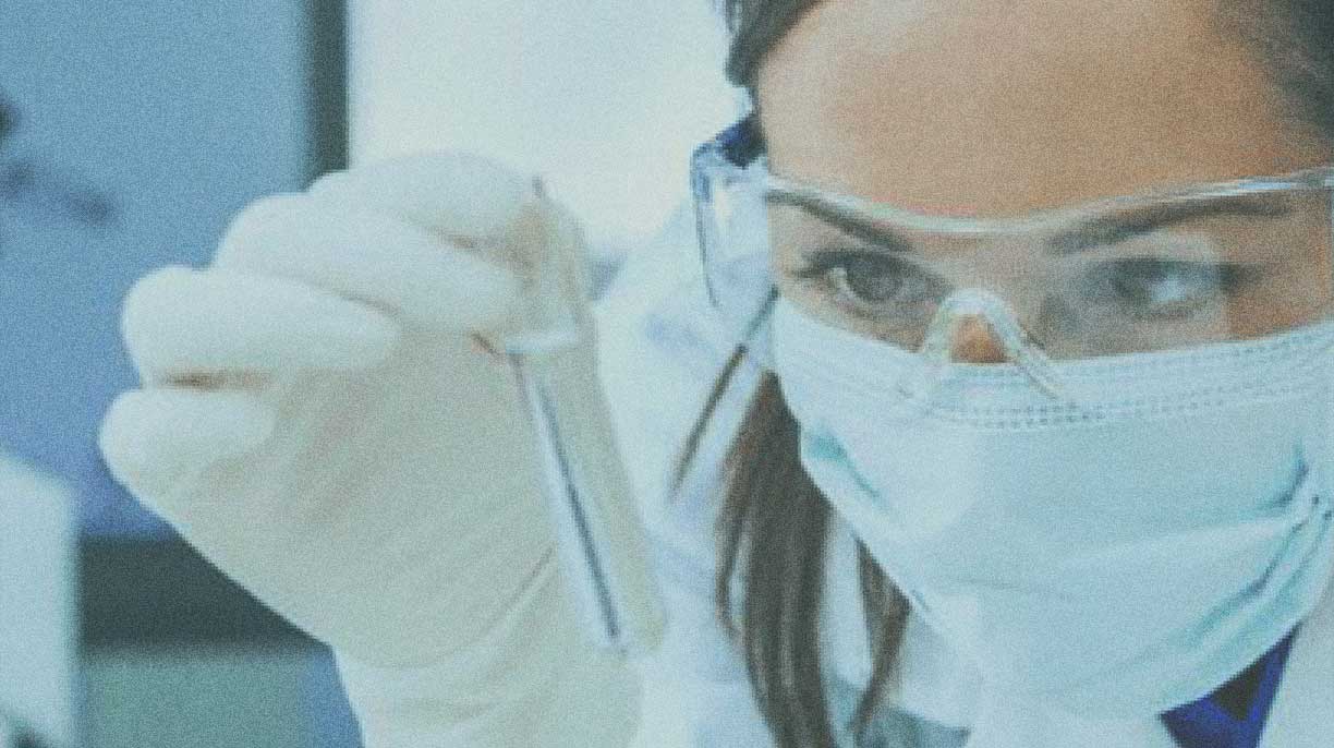 doctor with mask and glove working in a lab