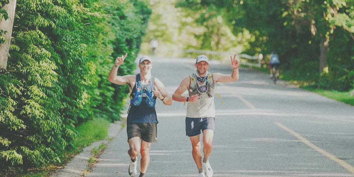 two men running a marathon