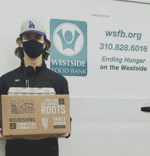 Man holding food in box