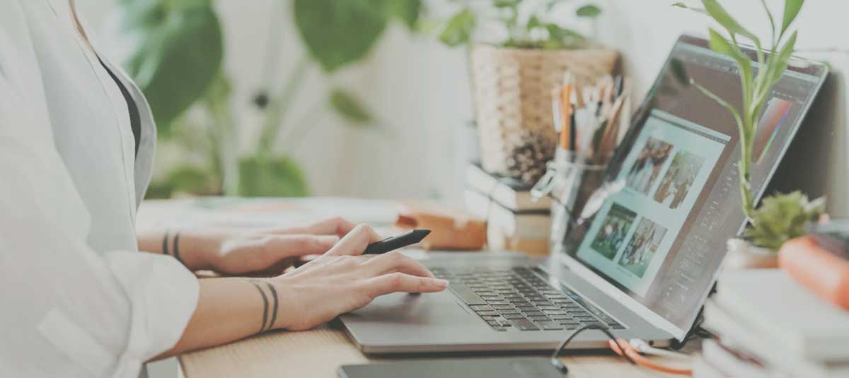 person typing on laptop